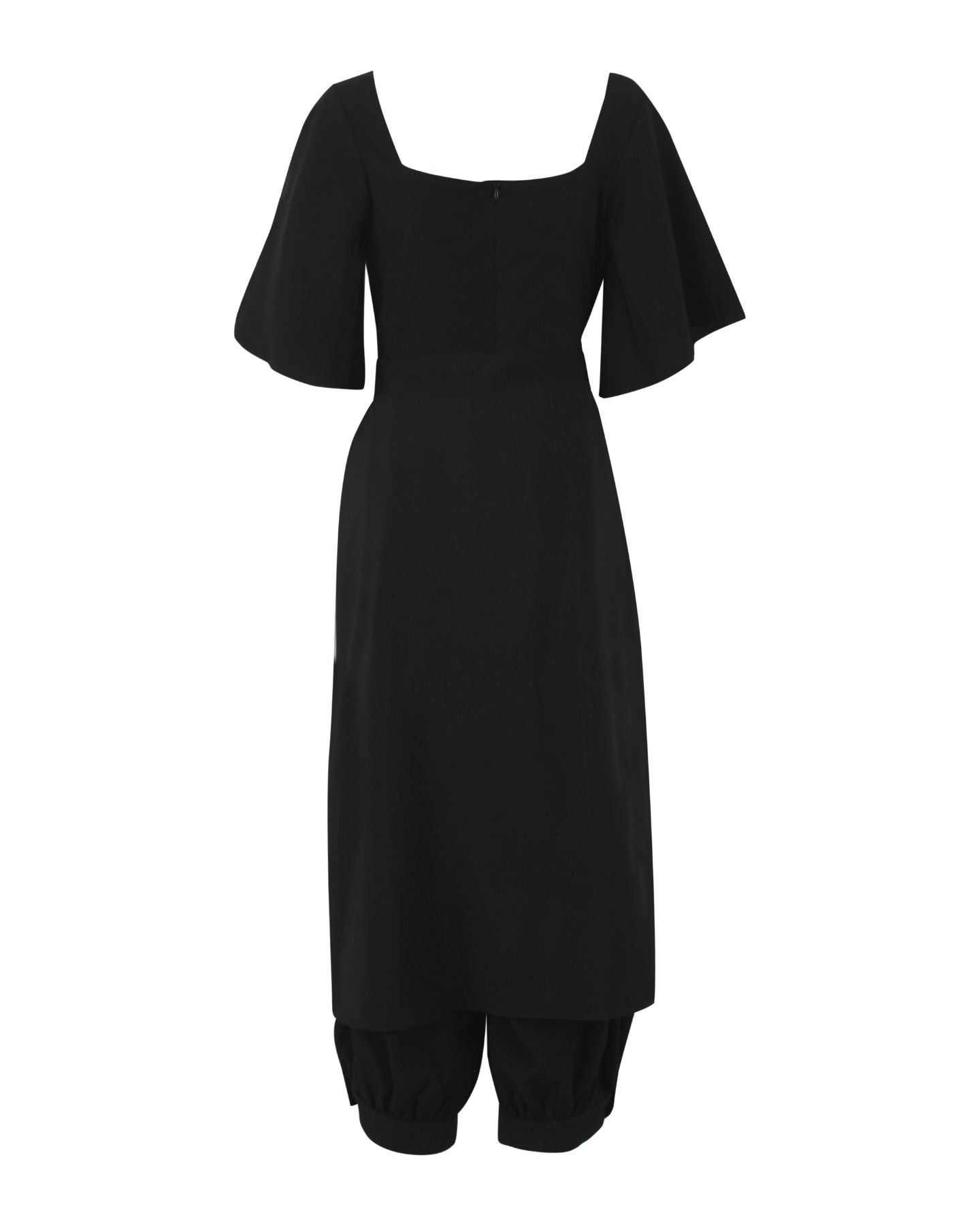 Moucharabieh Wrap Jumpsuit, back view showing square neckline, flutter sleeves and cuffed leg hems below the wrap skirt